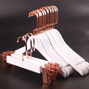 Image of Elegant classic white short hook display wooden coat hangers for clothes