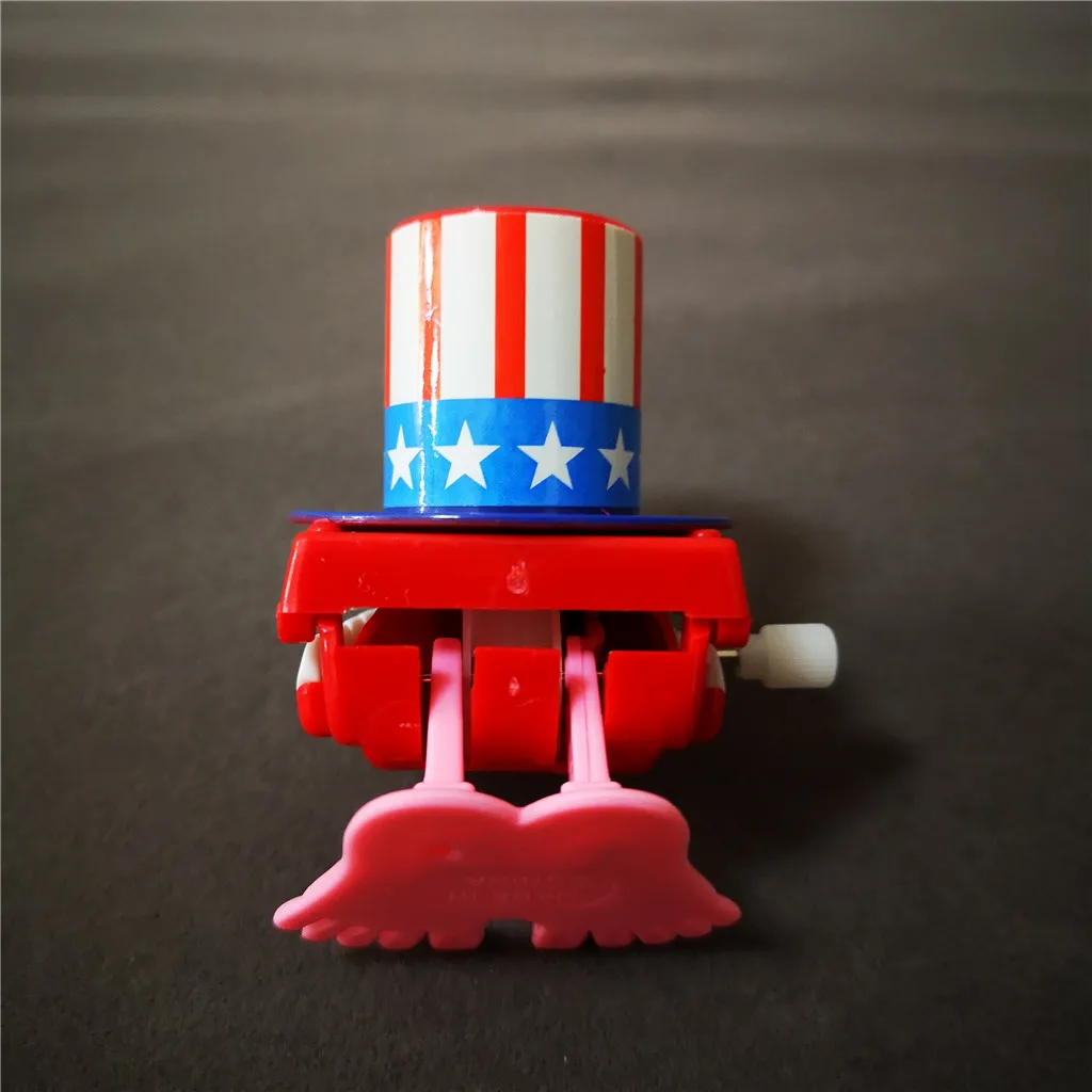 Jumping Wind up chain red lips teeth with hat Dancing toys