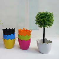 

Attractive colorized eggshell shape plastic flower pot