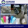 coloured sugar crystal rock candy making machine on a stick