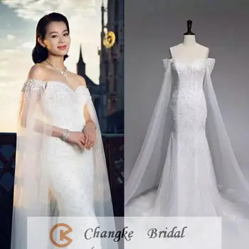 abito da sposa con mantello