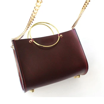 gold ring handle bag