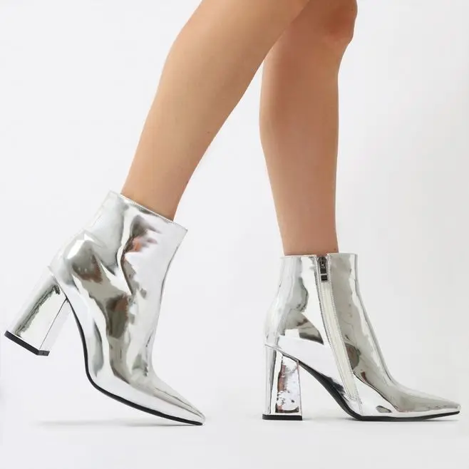 flared block heel high ankle boots