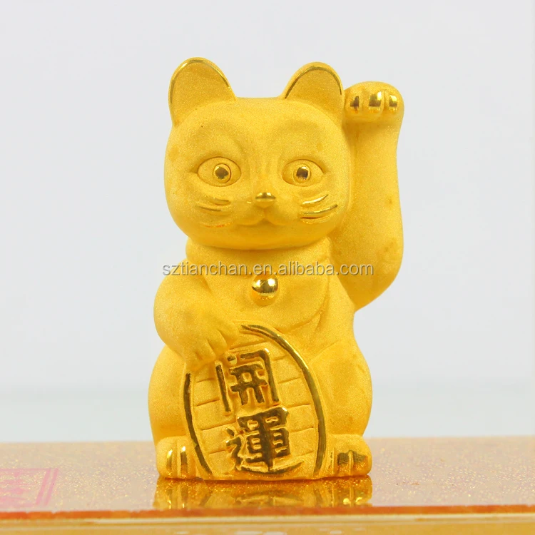 gold cat figurine