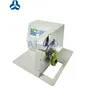 Wire harness tape wrapping machine and coil winding machine