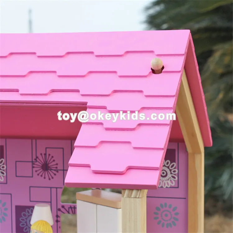 wooden doll house pink