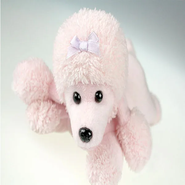 pink and white stuffed dog