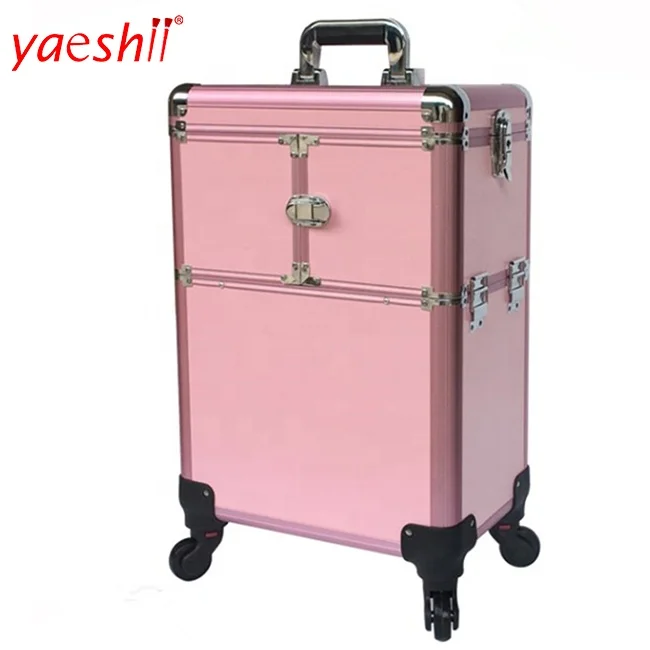 

Yaeshii Wholesale Aluminium pink or black color large trolley beauty makeup case with 4 legs