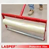 Carpet Shield Self-adheasive film protecting textured surface from paint and other spills