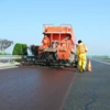 Road asphalt slurry seal paver machine