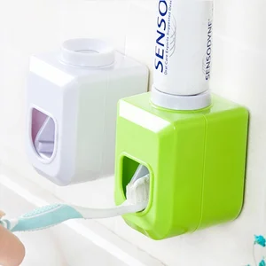 Image of Plastic 4 colors automatic toothpaste dispenser /squeeze toothpaste dispenser