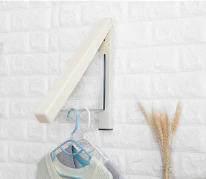 Image of Folding and retractable metal ABS plastic triangle shape clothes drying rack mini expansion dryer