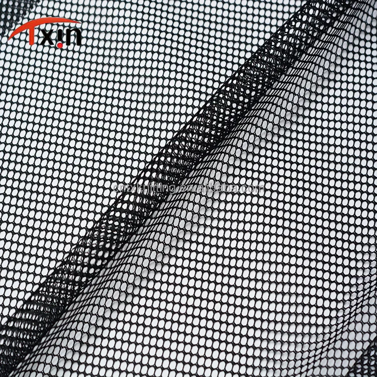 
draw Textured yarn black hexagonal net fabric made of polyester 