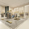 Boutique Women Clothes Store Stainless Steel Clothes Rack Wall Mounted Clothing Rack Brass Gold Floor Clothing Display Racks