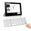 Factory price slim portable mini folding foldable bluetooth keyboard with trackpad