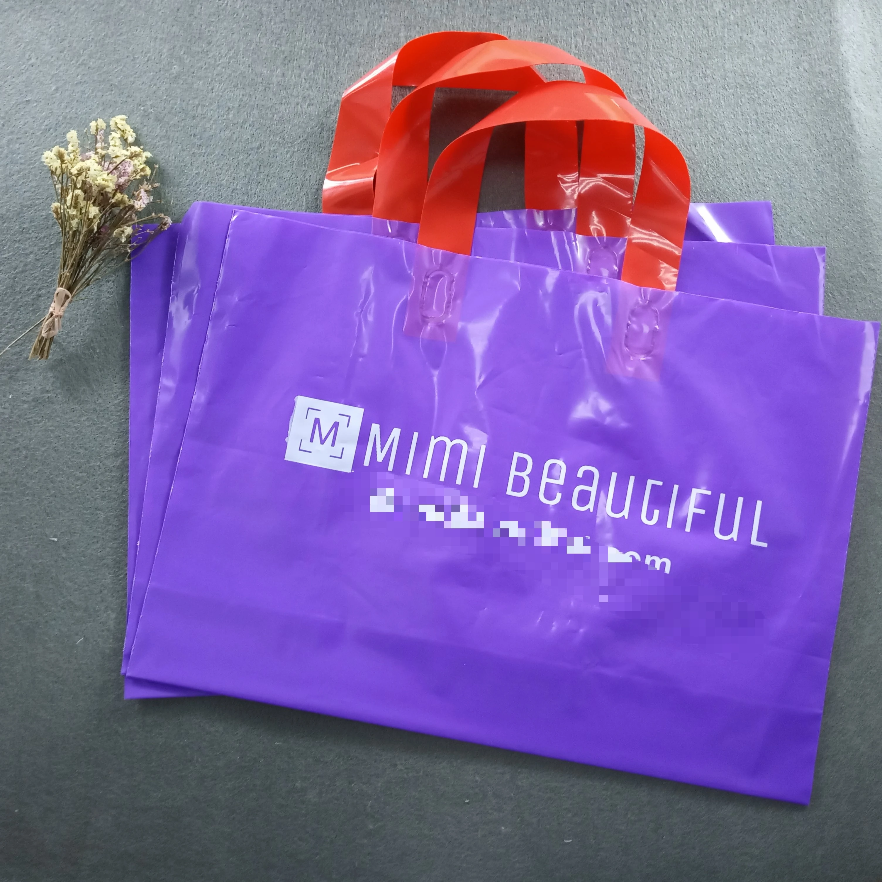 

Custom print soft loop purple plastic bag with handle for shopping packaging
