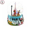 Custom made led eiffel tower souvenir water filled snow globe