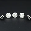 Prong type snap button printed white heart logo in centre