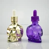clear purple pink 30ml 1 oz skull glass bottle with childproof cap for e liquid