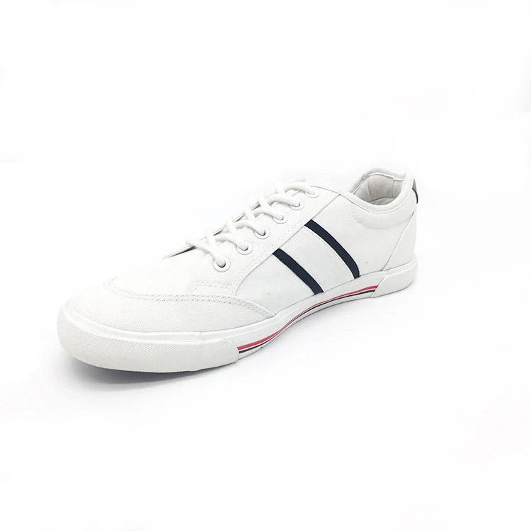 white canvas running shoes