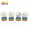 Cartoon style resin rainbow unicorn snow globe