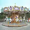 outdoor fairground attraction amusement rides carousel on trailer