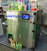 Free date printer fruit flavour water packing machine for stand up pouch with spout
