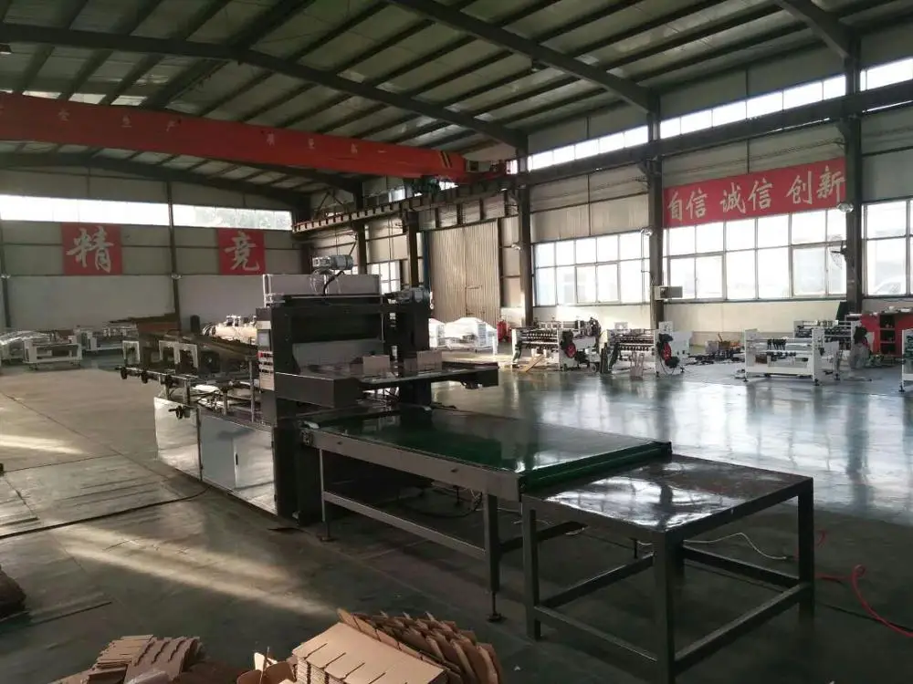 Corrugated Cardboard partition assembler machine.jpg