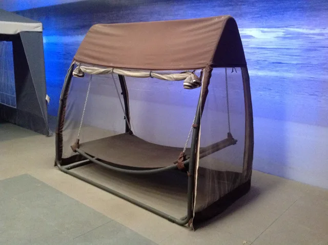 camp bed under enclosure