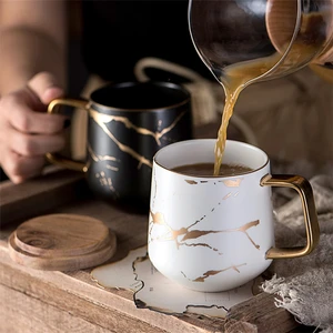 Image of Wholesale golden handle marble ceramic coffee mug with wooden lid