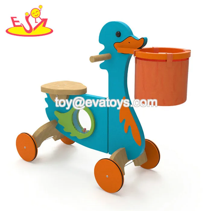 wooden toy duck on wheels