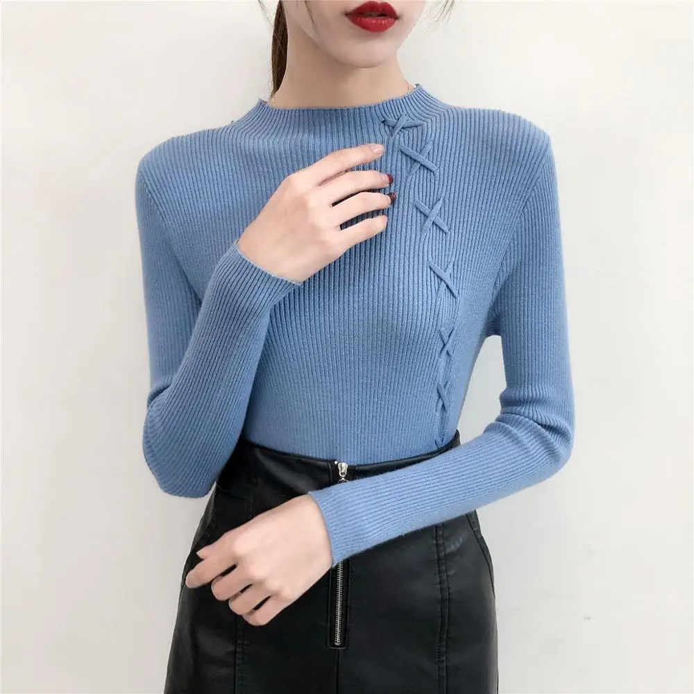 

Wholesale In Stock long sleeve Fancy Cross woman sweaters