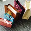 /product-detail/china-factory-cheap-high-end-fancy-paper-bags-with-handles-white-60513123439.html