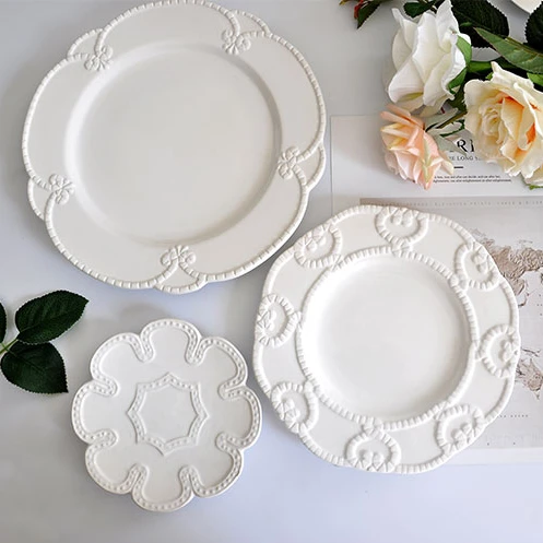 

Nordic Grace Designs Ceramic White Embossed Wedding Table Plates, White color