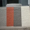 embossed steel siding in stone and brick patterns