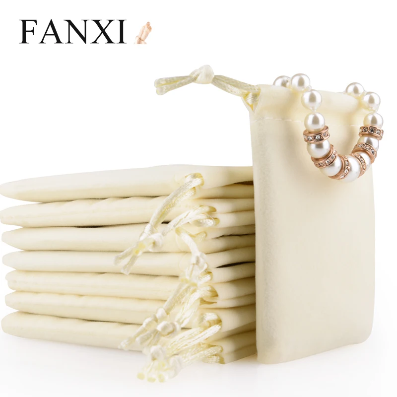 

FANXI Chinese Manufacturer Wholesale Stock Velvet Jewelry Bag Rings Earrings Necklace Charm Gift Package Jewelry Pouch with Logo, Customized color for jewelry pouch with logo