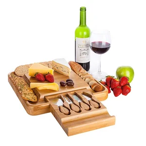 Image of bamboo cheese cutting board with stainless steel knives set