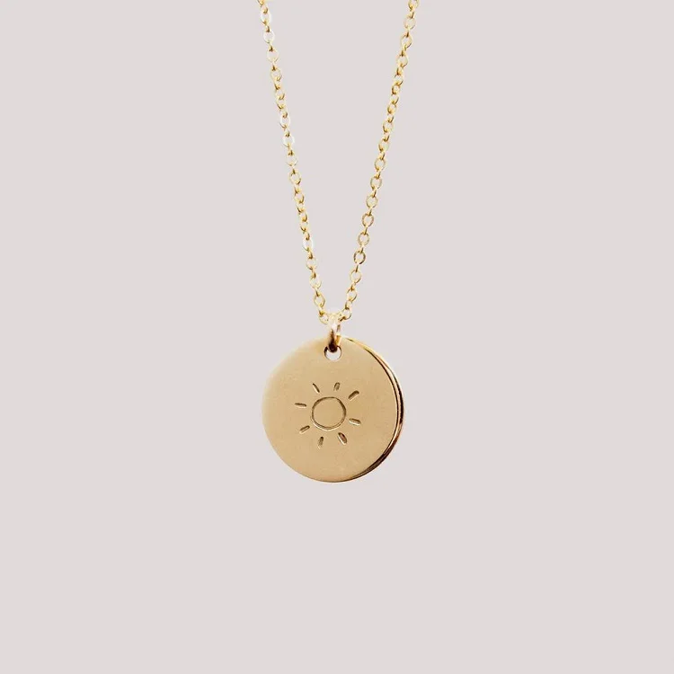 engraved sun necklace