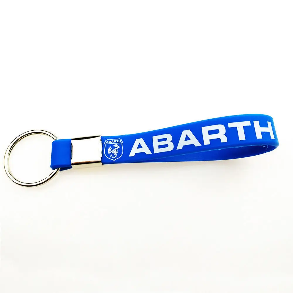 
OEM Custom Rubber Keychain For Fashion Logo Brand Name Soft Silicone Wristband Keychain 