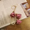 PU leather flower keychain with pearl ring