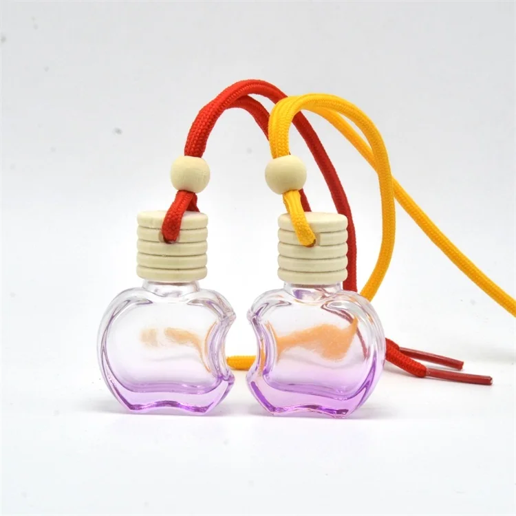 

Clear color round hanging rope wooden cap glass car perfume bottle