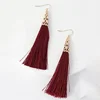 Trendy tassel dangle engraved gold caps earrings wholesale