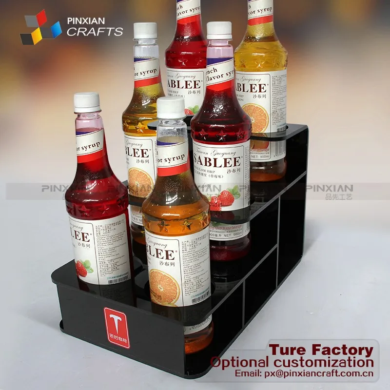 Botella de licor de botella de líquido botella pantalla rack levitando