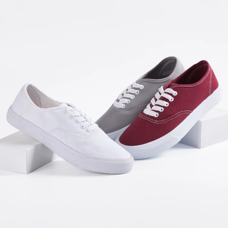 

Wholesale Low MOQ OEM Design Cheap Price Canvas Injection Casual Shoes, White or customized