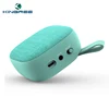 Hot sales portable bkk mp3 music player fm radio fabric bluetooth speaker customized logo.