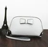 Hot new genuine leather lady purse fashion bow tie cosmetics bag multi-function shell zero wallet card bag