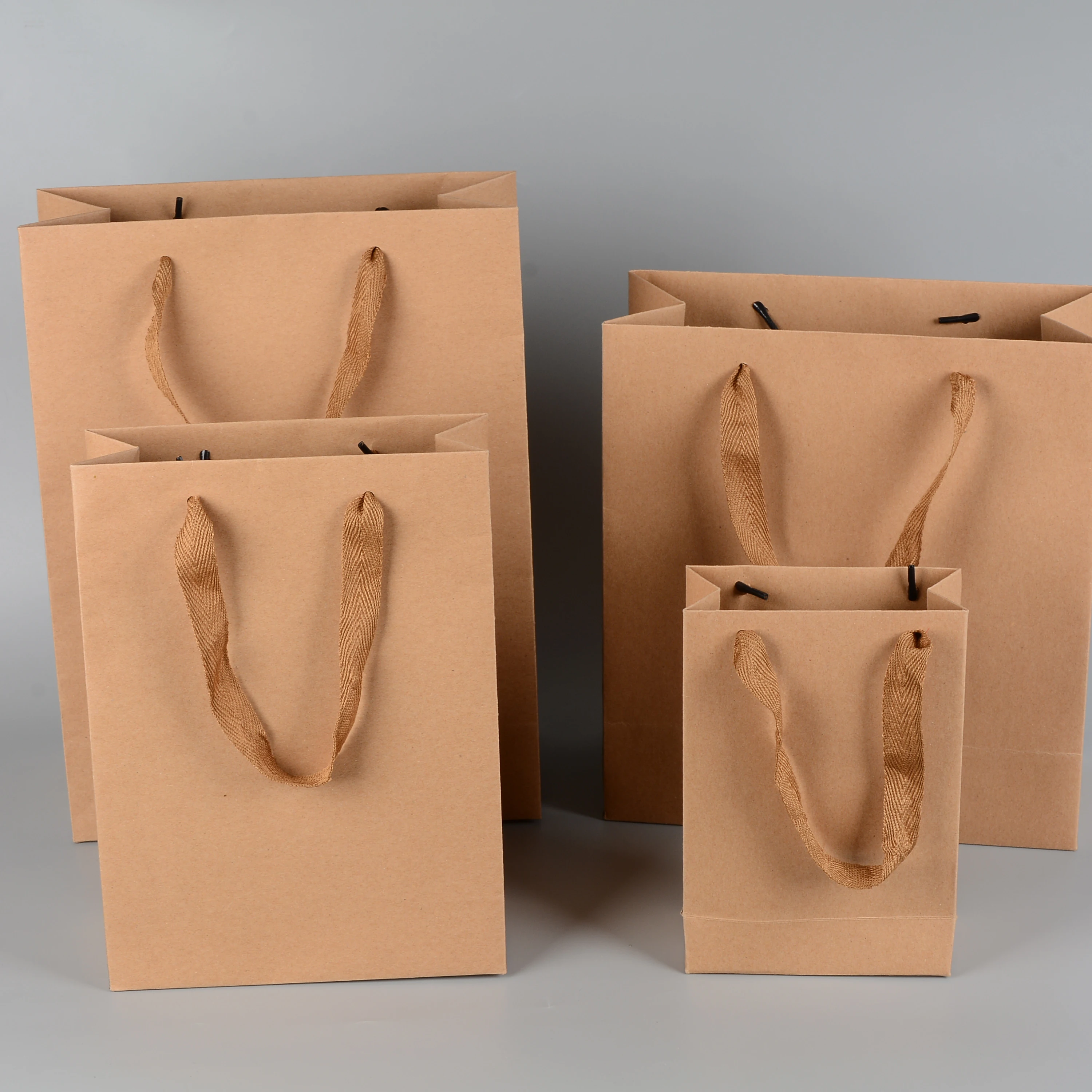 

Top quality twisted handle custom kraft paper bag for shopping