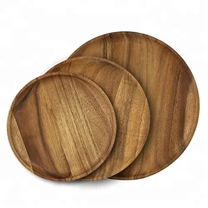 Image of wholesale round acacia wood plates for dinner serving