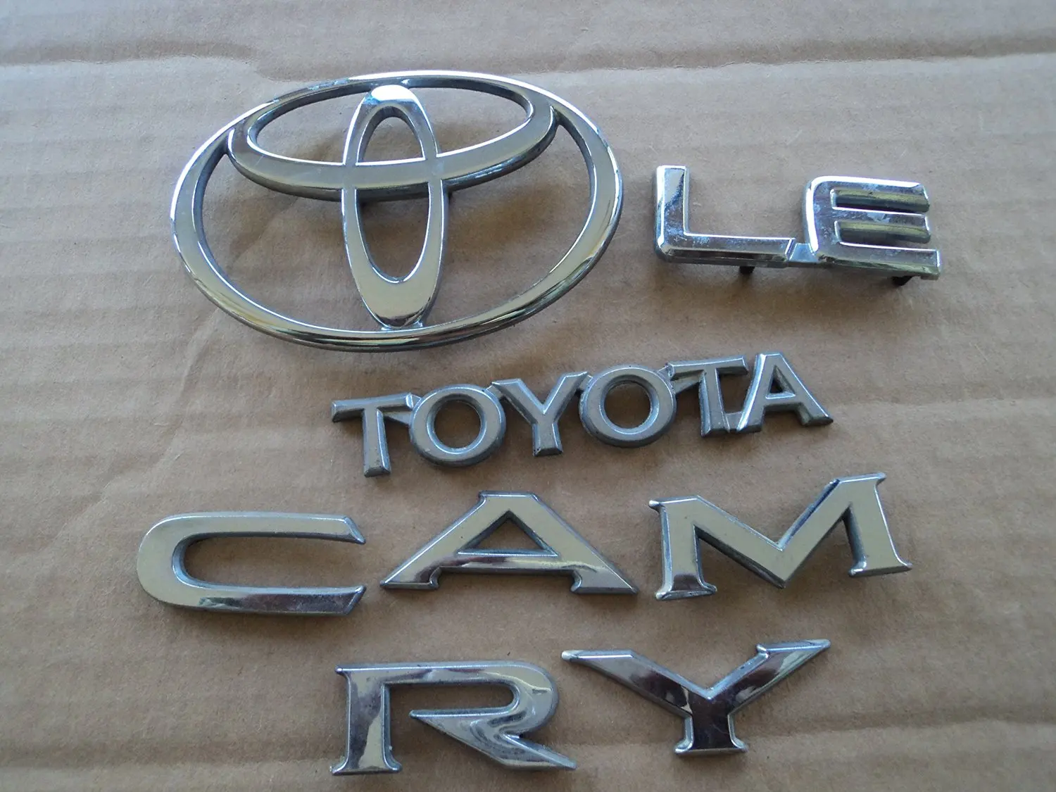 92 94 Toyota Camry Le Lid Trim Chrome Logo Badge Separated Used 92 94 Toyota Camry Le Lid Trim Chrome Logo Badge Separated Used Emblem Decal Set