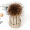 Cute design Europe hot sell big hair ball russian warm winter knitted young girls winter hat